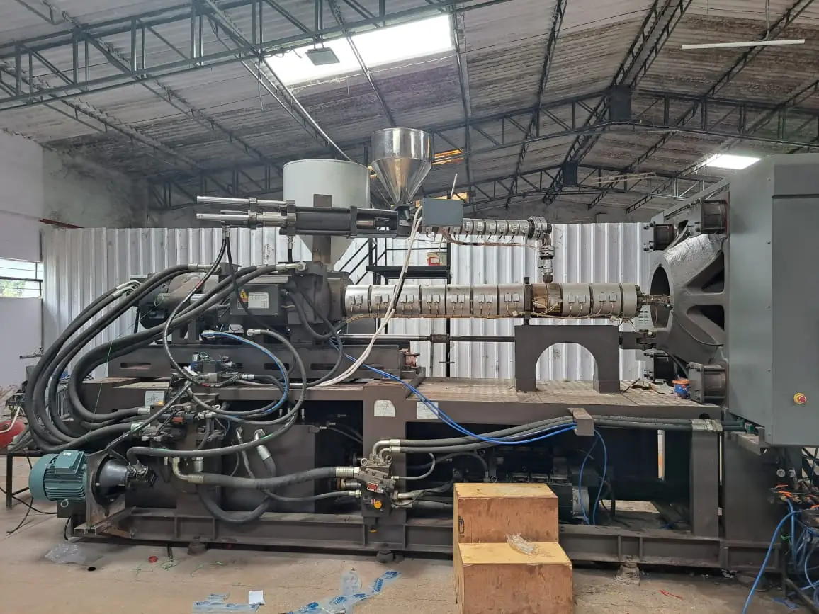 Injection moulding machine on a factory floor